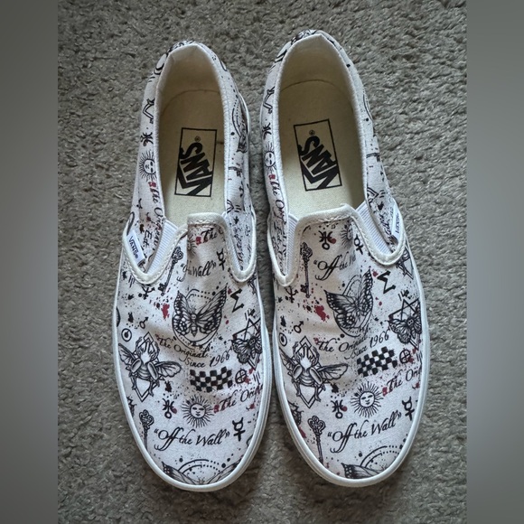 Vans Shoes - Vans White Slip-On Sneakers with Black Tattoo Graphics and Red Splatter